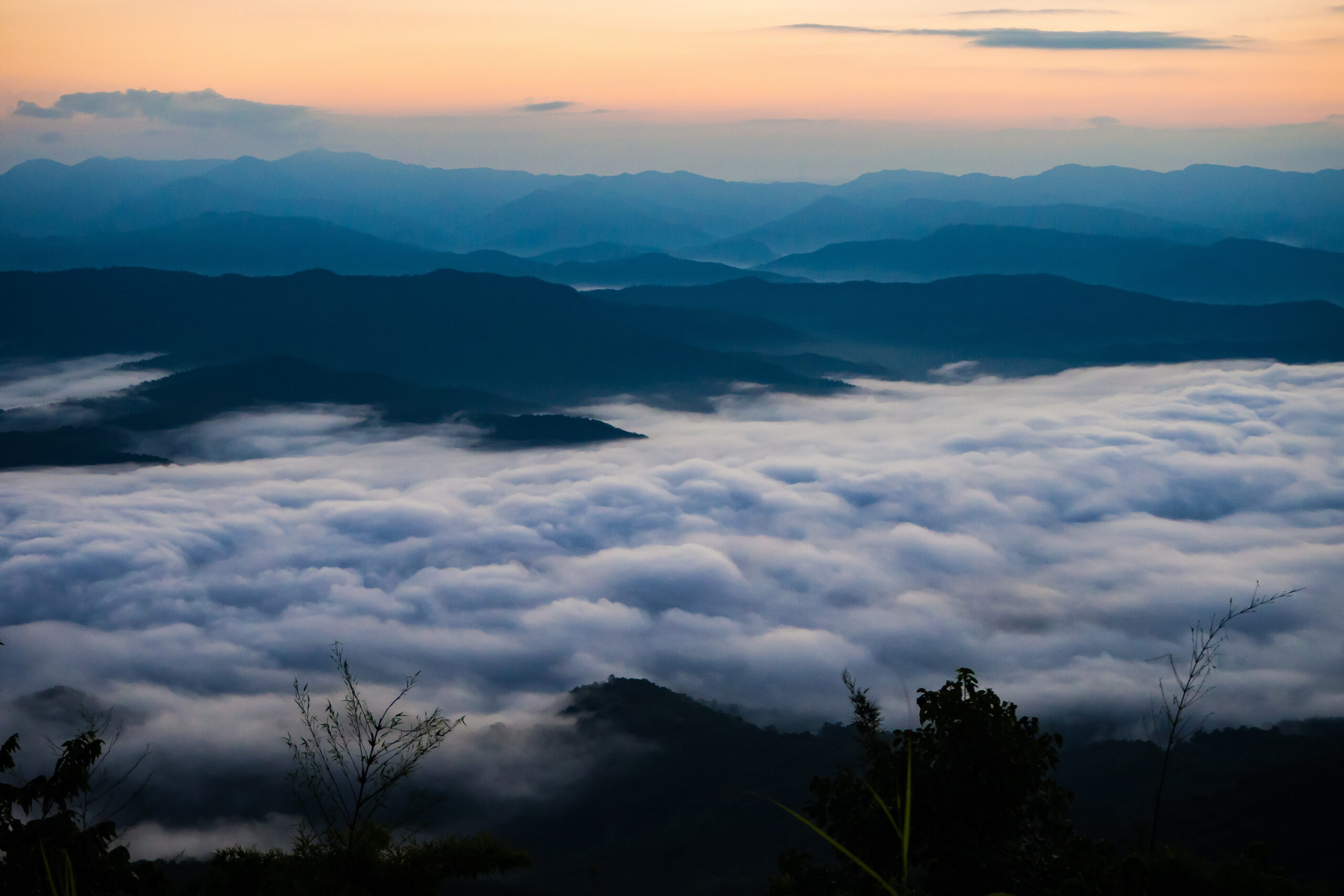 sunset overlooking mountains with Mist