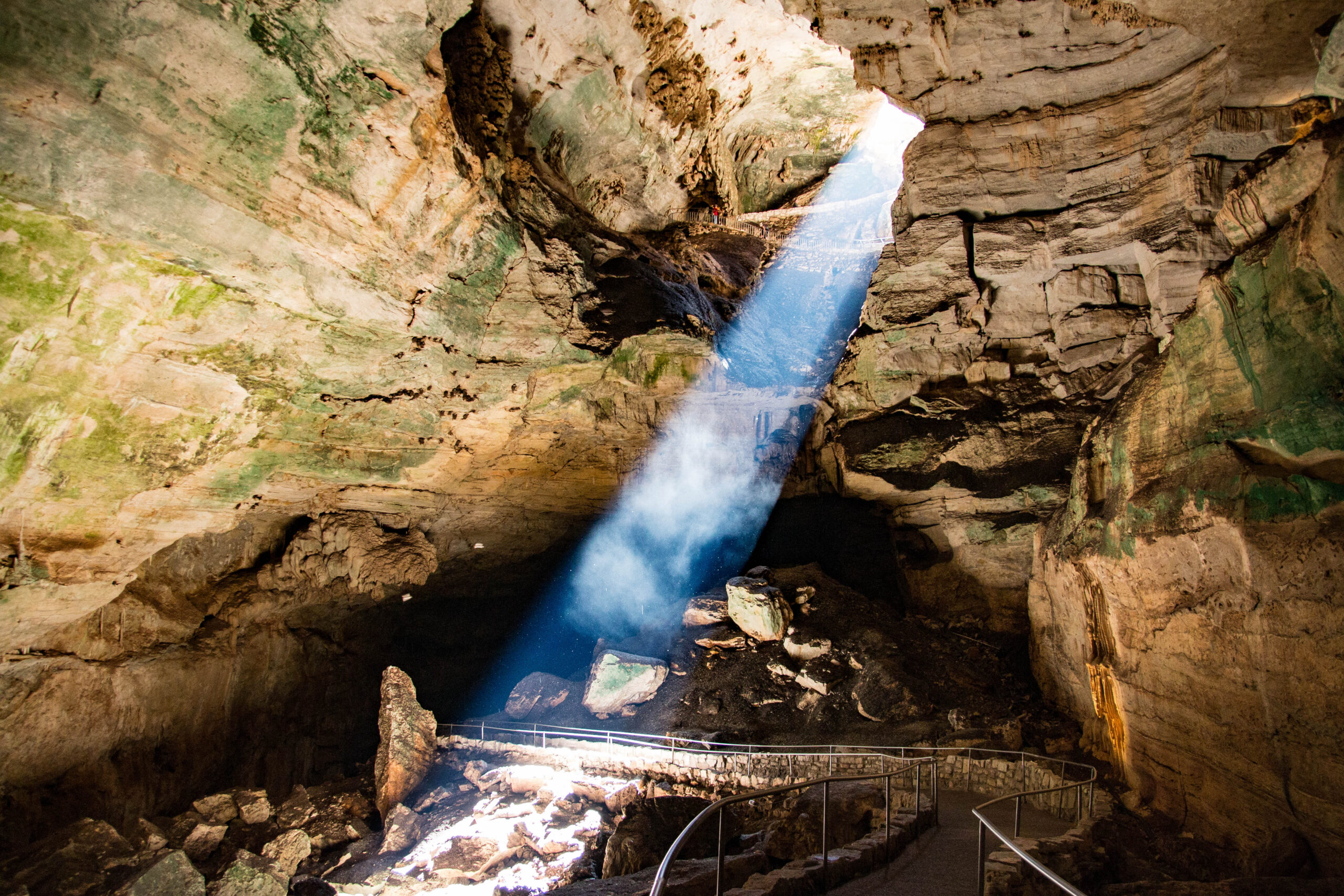 Carlsbad Caverns National Park Guide 2026 digital PDF featuring the Big Room, Natural Entrance Trail, timed-entry reservations, bat flight program, ranger tours, pets, and family tips